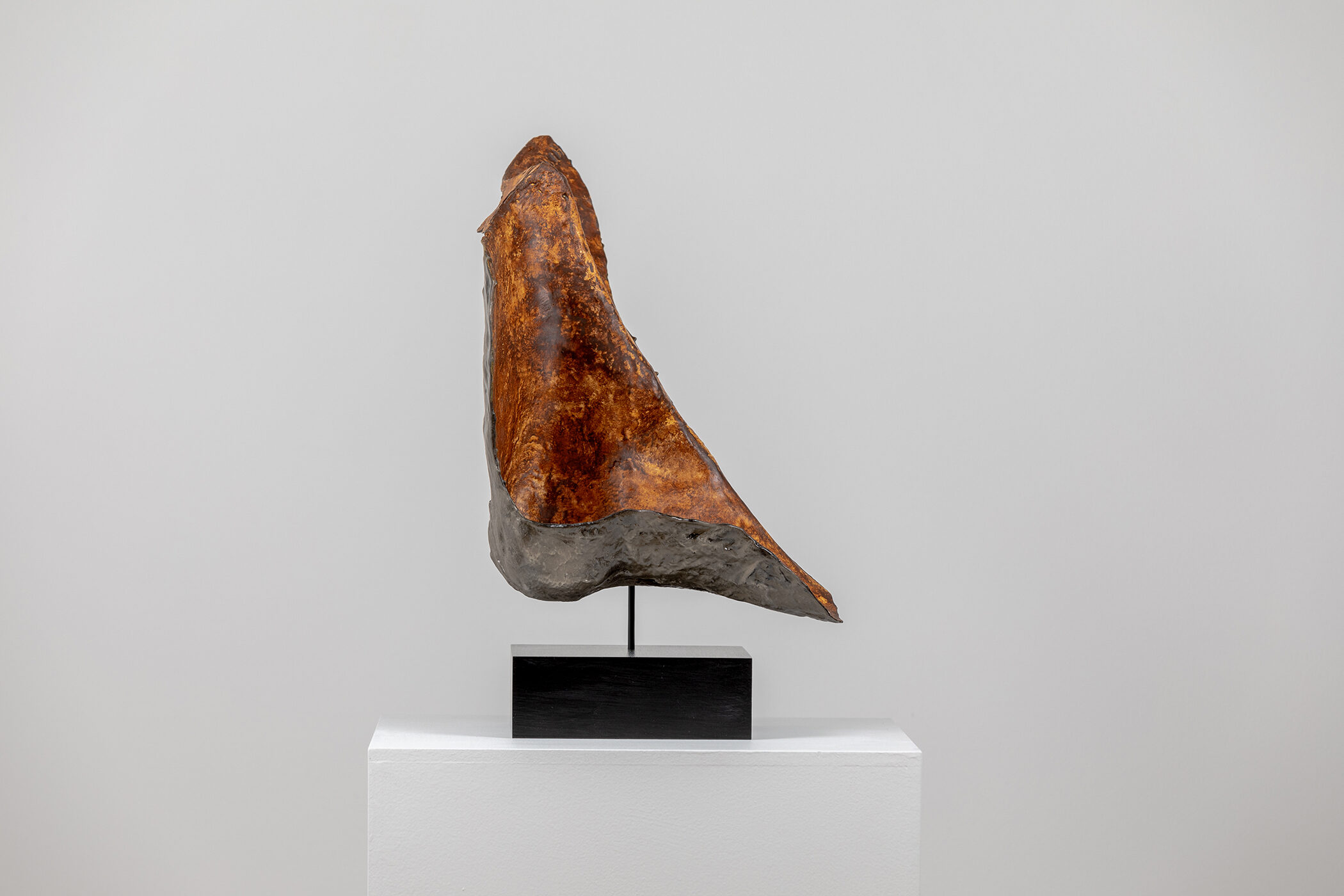 Spartan Skin (Prayer to Leonard Jungwirth); Cold-cast Nickel Silver, pigmented resin, acrylic paint, pigmented wax medium, steel, dyed walnut; 16” x 15” x 12”; 10” x 15” x 12” (with base)